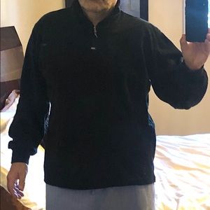 Black fleece sweater.